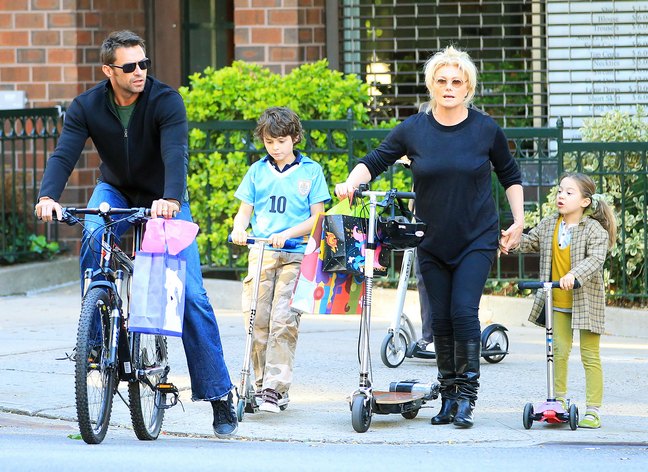 Hugh Jackman, jeans, black sweater, sunglasses, bike, Deborra-Lee Furness